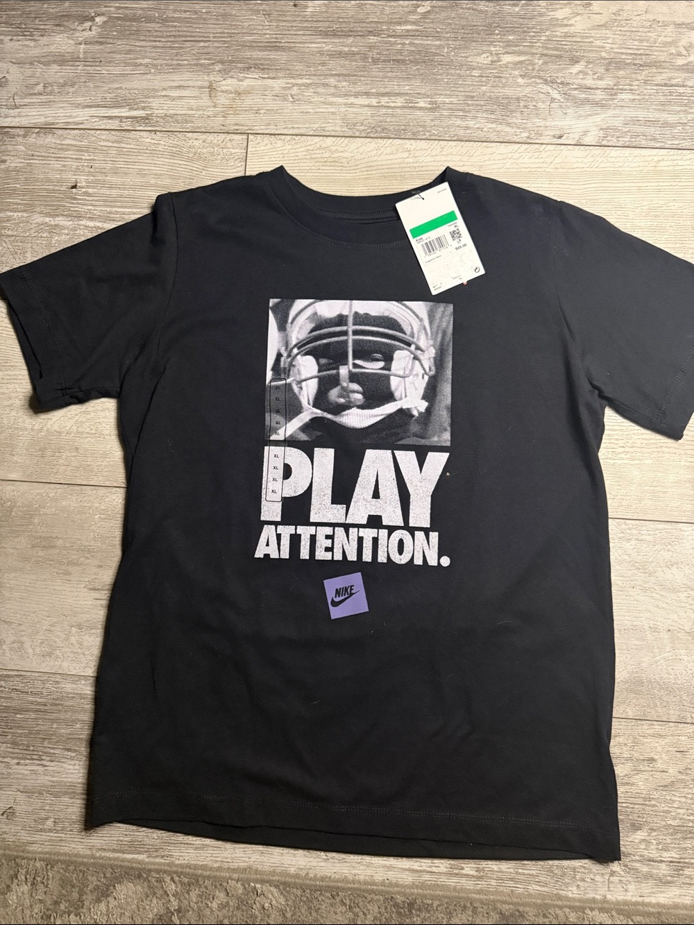 Nike Black Graphic 'Play Attention' Tee with White Print and Purple Logo